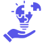 Eine Hand mit einer Glühbirne als Puzzle als Darstellung für Kreative Spots